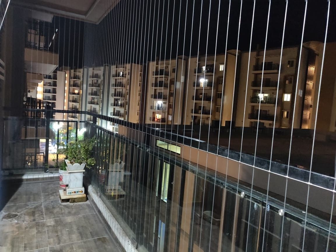 Balcony invisible grill for child safety in Delhi NCR